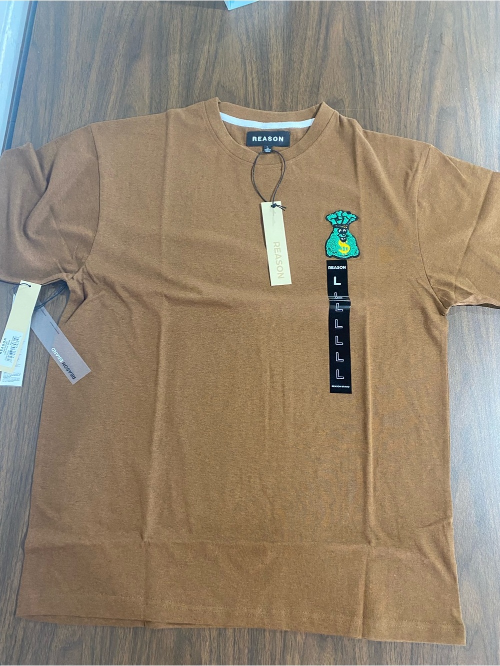Reason  men’s Brown Short Sleeve Crewneck Tee with Green Embroidered Money Bag